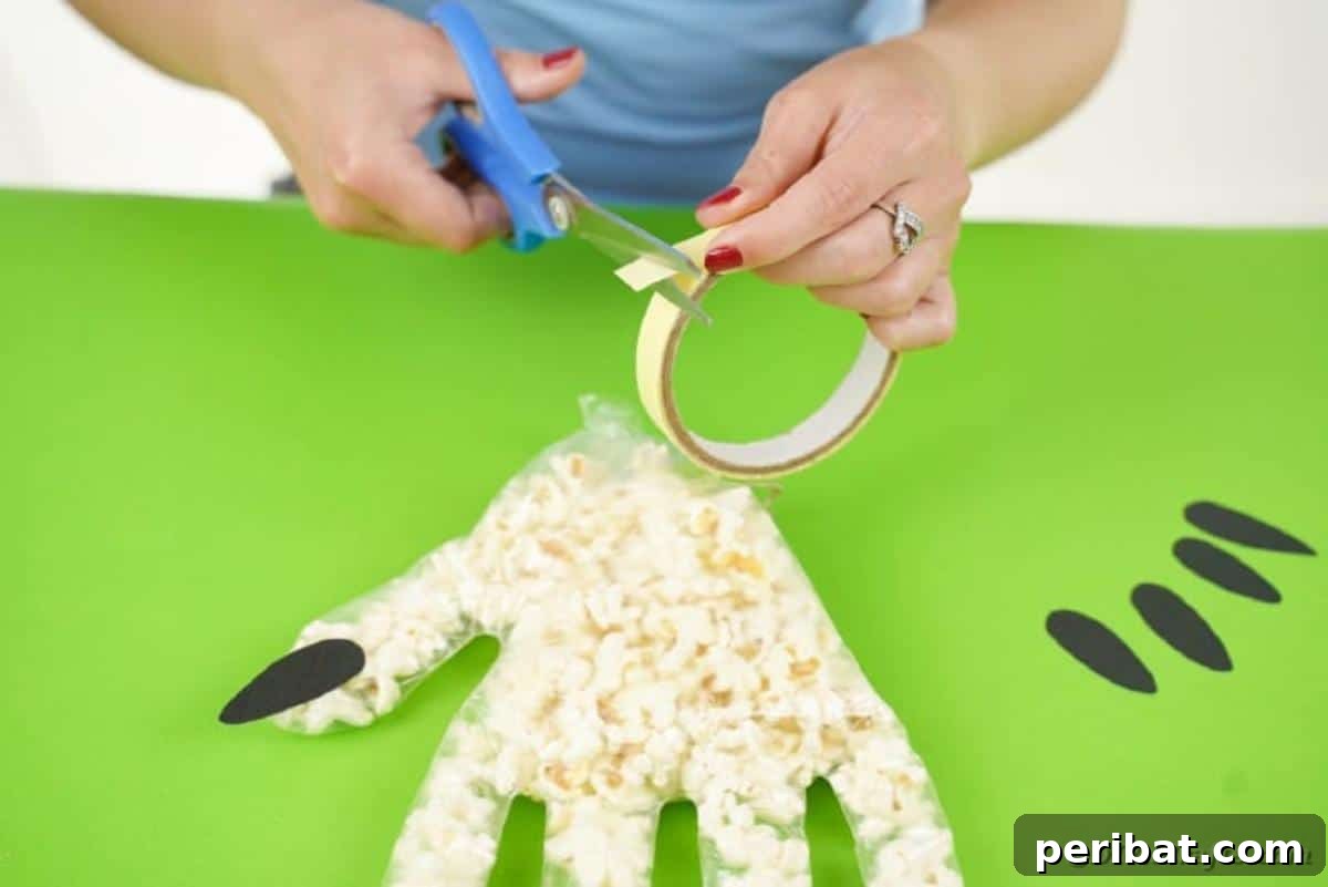 Creepy Popcorn Hand Snacks 14 Cutting masking tape