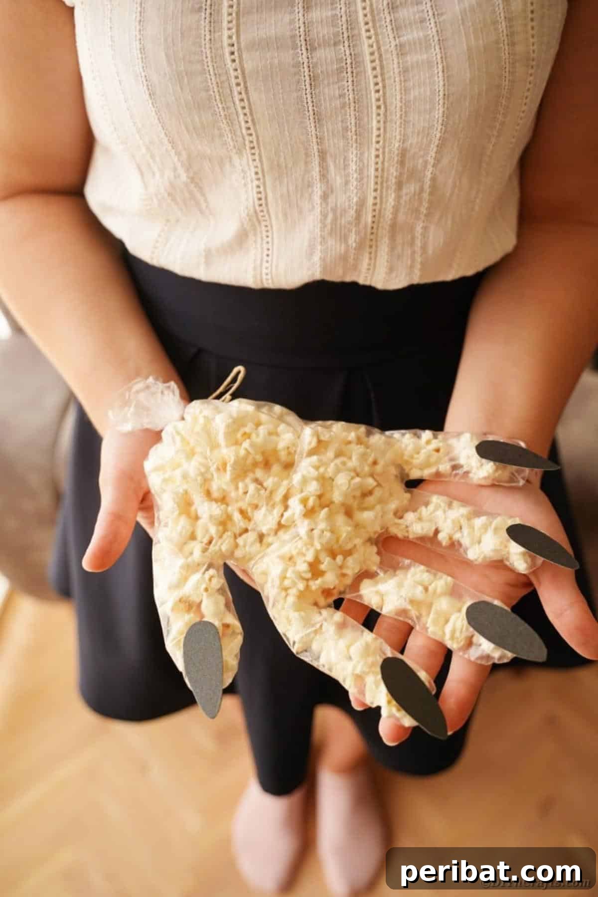 Creepy Popcorn Hand Snacks 17 Woman holding popcorn hand