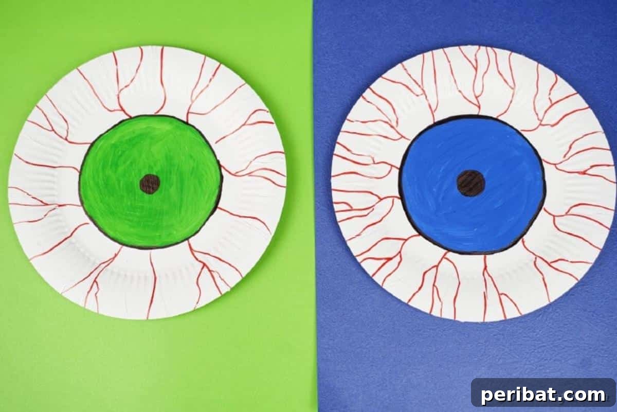 Staring Eyeball Halloween Plate Art 3 Paper plate bloodshot eyes on colored paper
