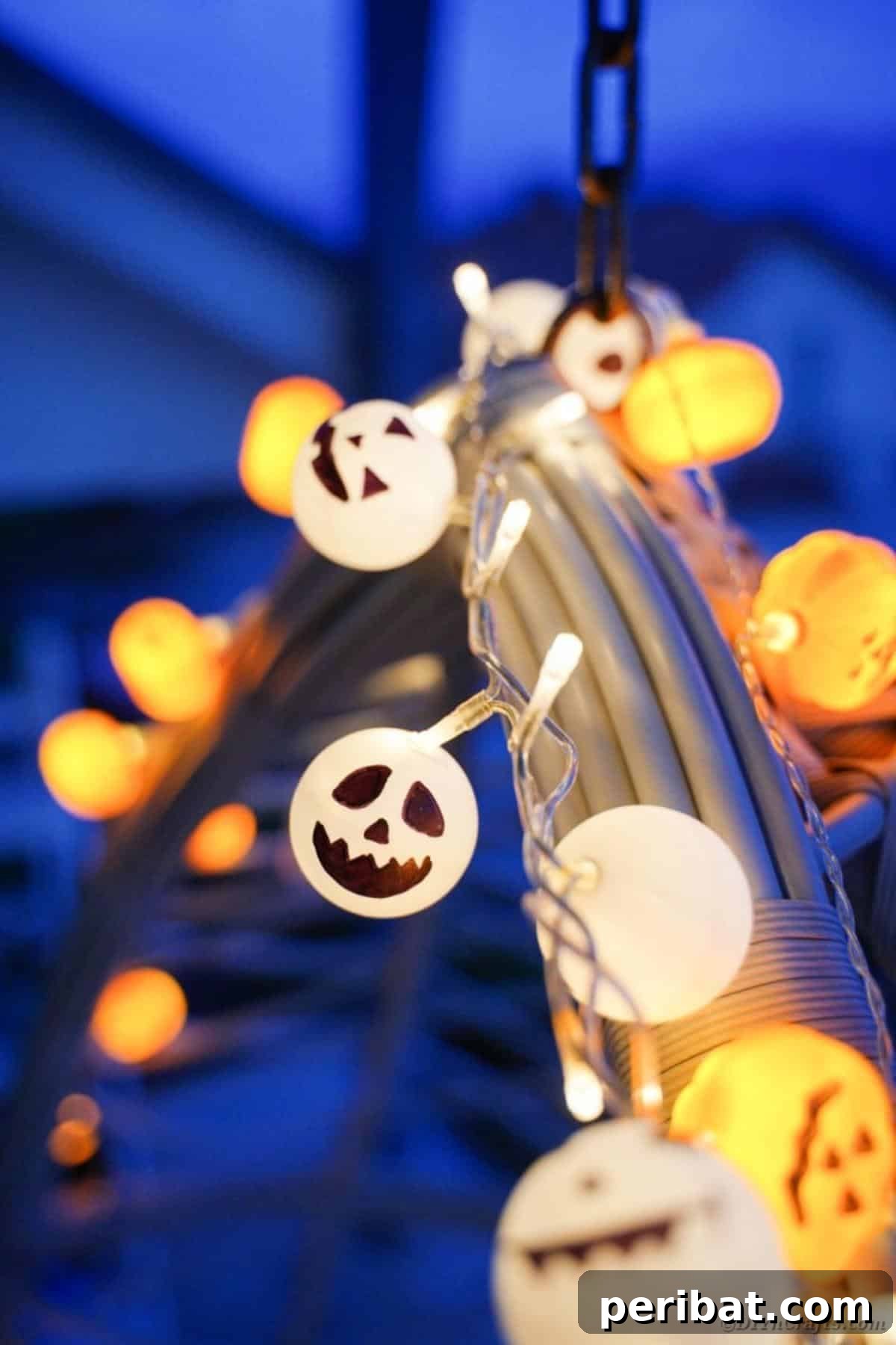 DIY Jack Skellington Halloween Garland with Ping Pong Balls 17 Ghost lights against dark blue