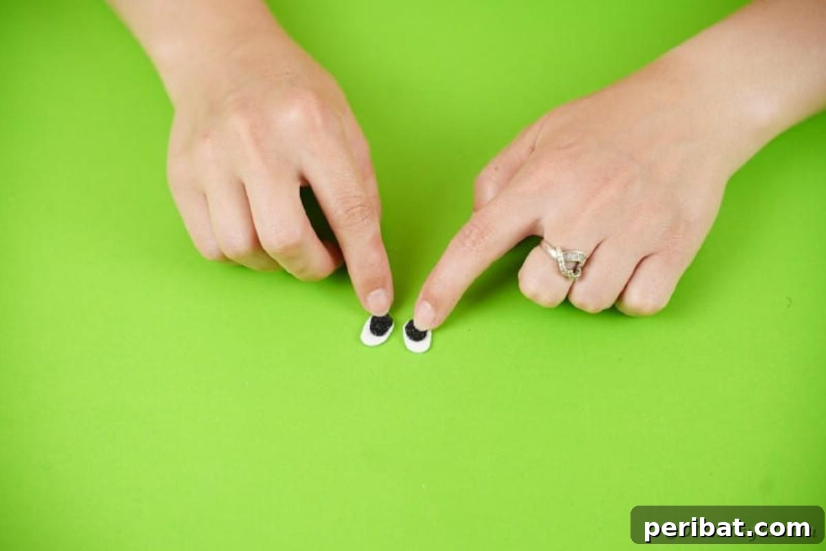 Gluing paper to make eyes