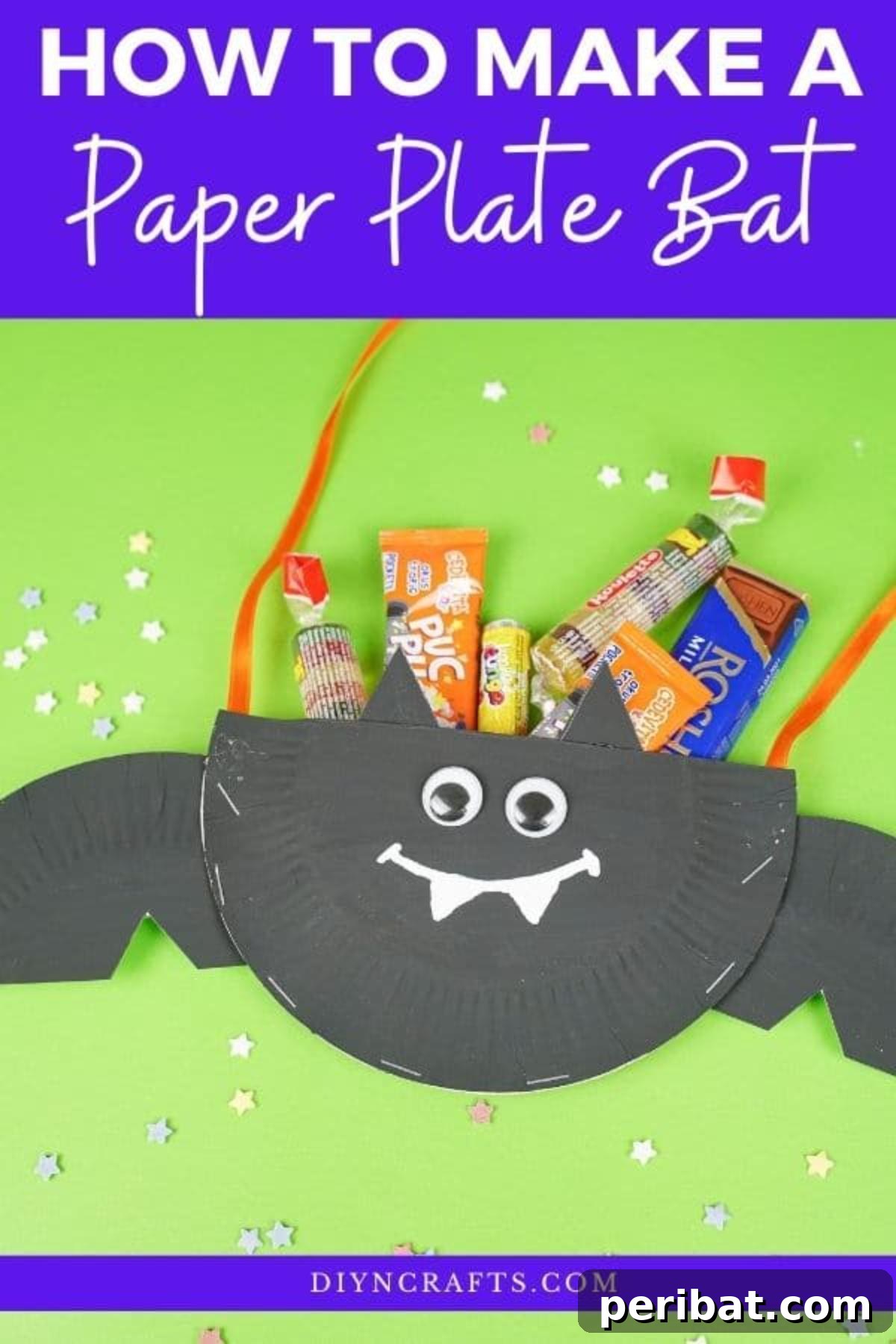 DIY Paper Plate Bat Candy Catchall 2 Paper plate bat on green surface filled with candy