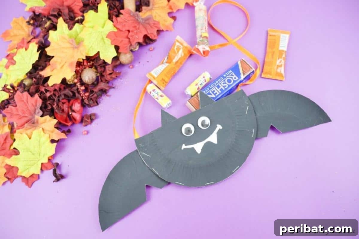 DIY Paper Plate Bat Candy Catchall 3 Paper plate bat on purple paper