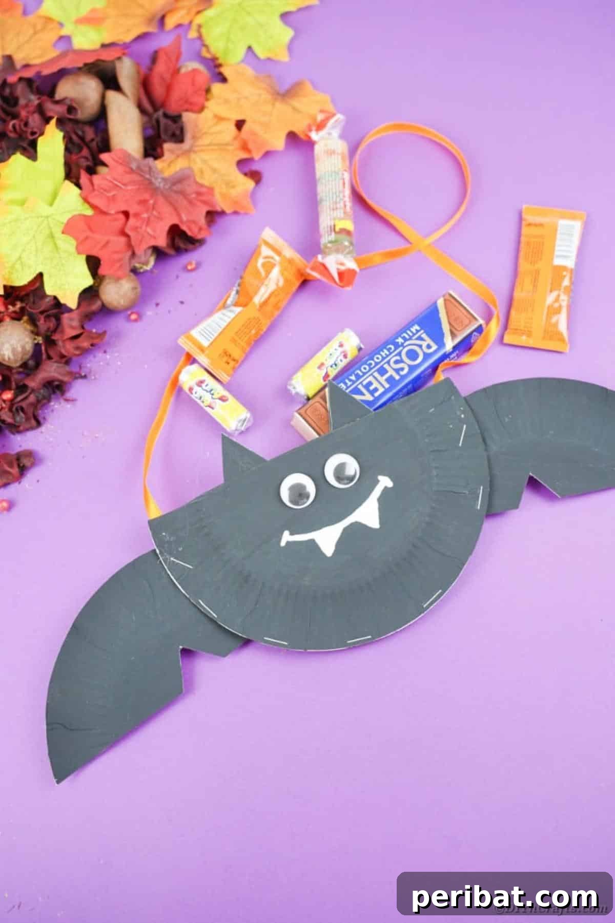 DIY Paper Plate Bat Candy Catchall 23 Paper plate bat on purple paper