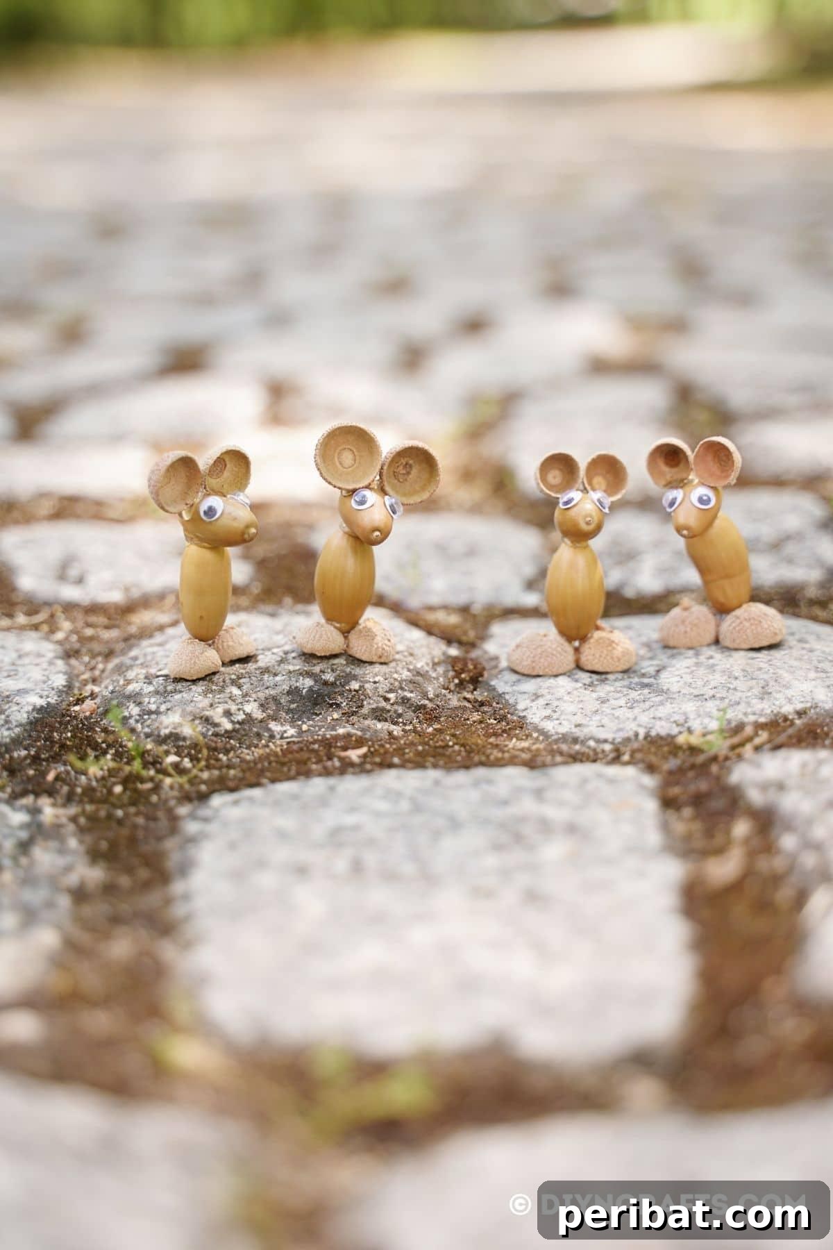 Craft Adorable Acorn Mice for Autumn Decor 22 4 acorn mice on cobblestone