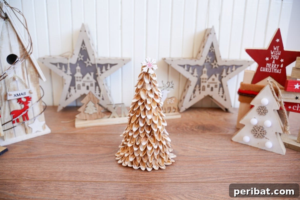 DIY Mini Christmas Trees from Upcycled Pistachio Shells 17 Small Christmas tree made from pistachio shells with holiday decorations