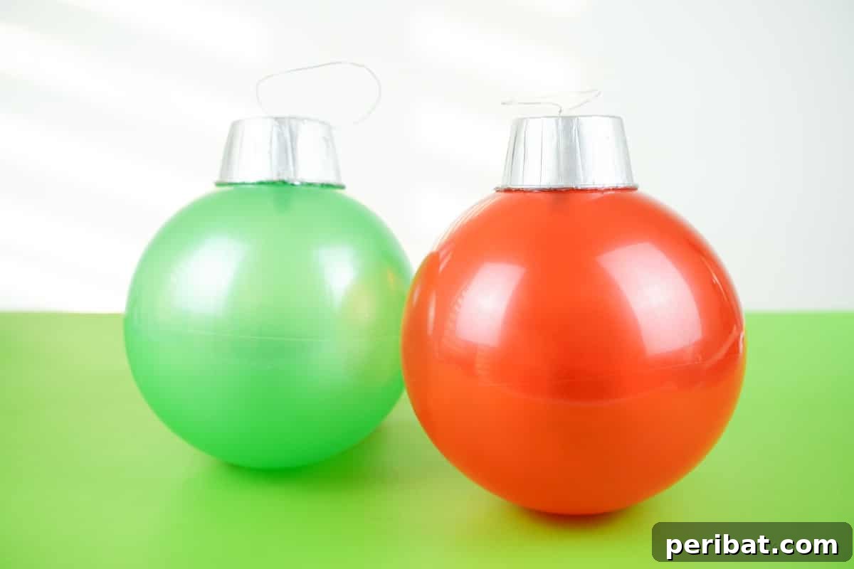 Rubber ball with spray painted bowls designed as giant ornaments