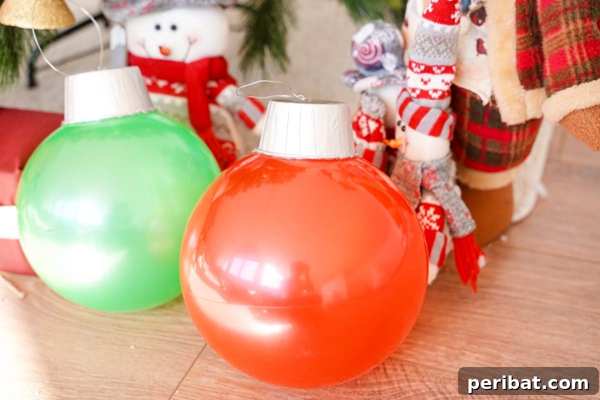 Christmas ornament ball craft with decorations, showing the cap detail