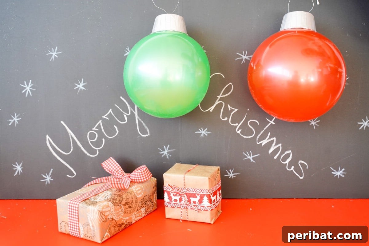 Chalkboard with ornament rubber balls and presents, showing personalized touches