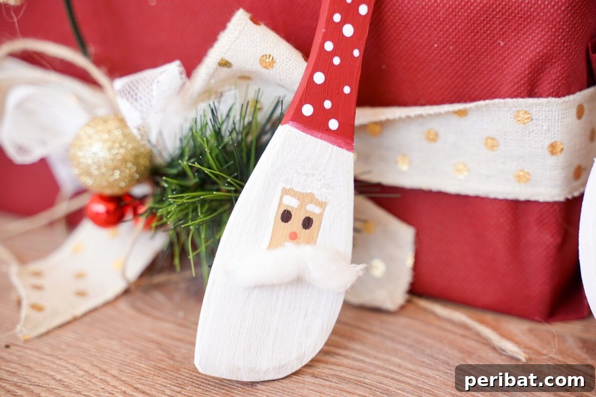Santa painted character spoon cleaning on present