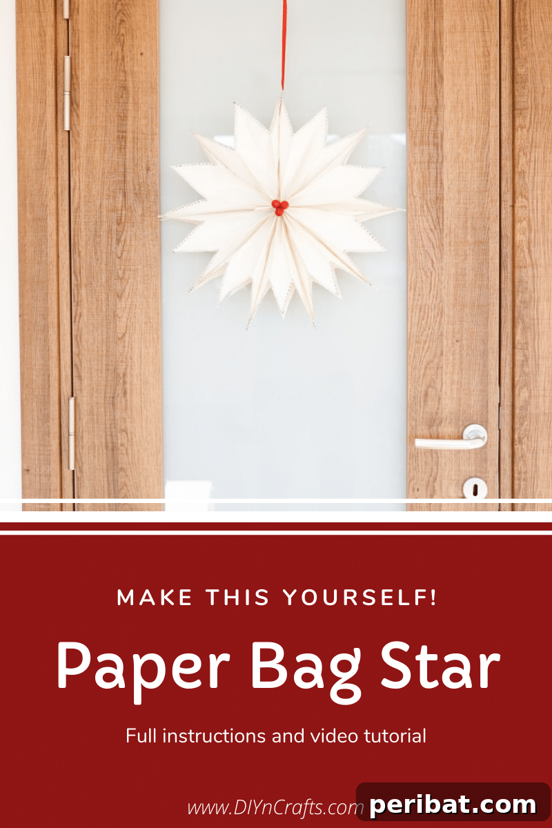 DIY Giant Paper Bag Star Decorations 2 Paper bag star hanging on a door, glowing warmly