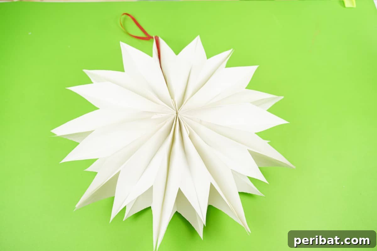 DIY Giant Paper Bag Star Decorations 14 Finished craft project on table, ready for display