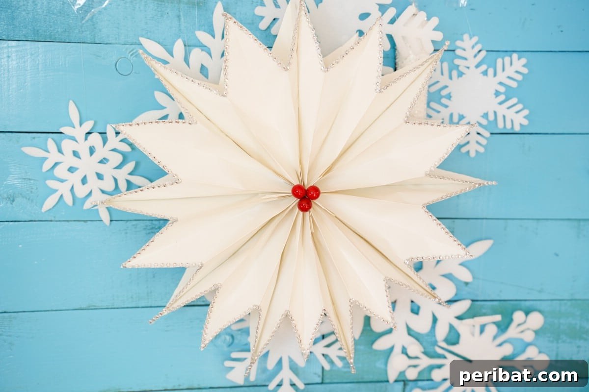 DIY Giant Paper Bag Star Decorations 20 Giant star on a blue background with snowflake stars