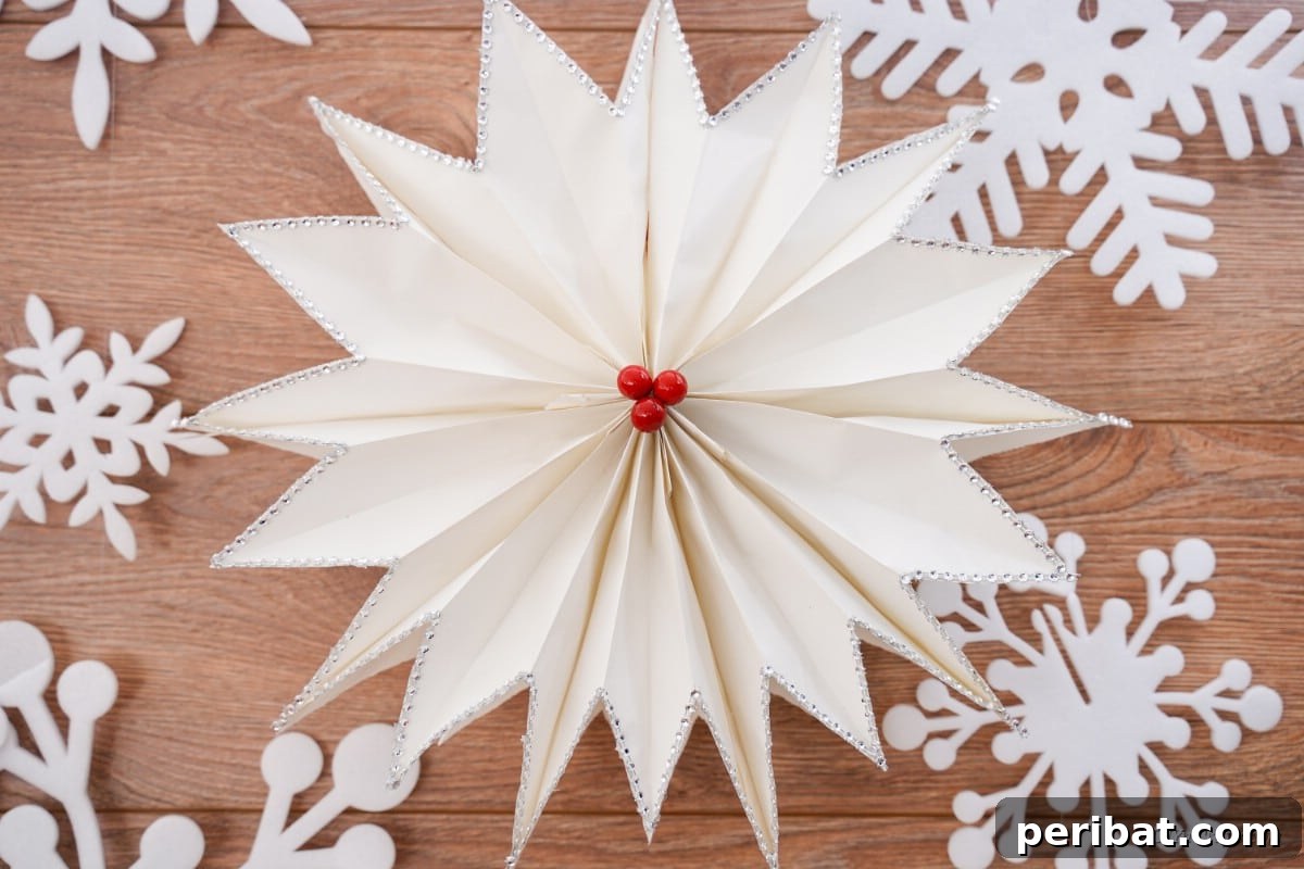 DIY Giant Paper Bag Star Decorations 22 Paper star craft with snowflakes, showcasing its elegant simplicity
