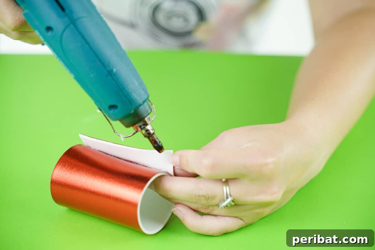 hot glue gun red foam craft sheet gluing together