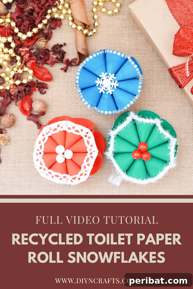 Roll-Upcycled Christmas Cheer 2 Snowflake craft on table