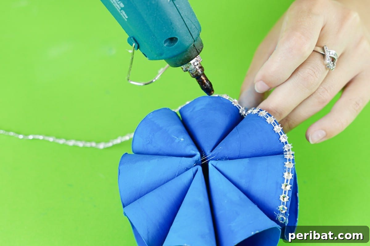 Roll-Upcycled Christmas Cheer 15 decorating craft with hot glue gun