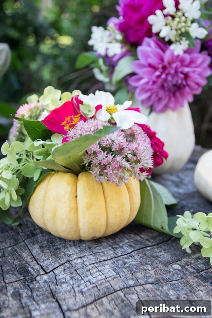 55+ Creative DIY Pumpkin Decorating Ideas for Fall 24 A vibrant yellow pumpkin ingeniously transformed into a vase, filled with fresh flowers