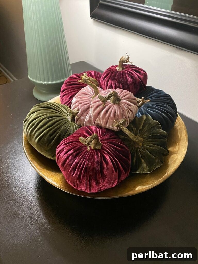 55+ Creative DIY Pumpkin Decorating Ideas for Fall 26 Exquisite miniature velvet pumpkins arranged artfully on a gold plate
