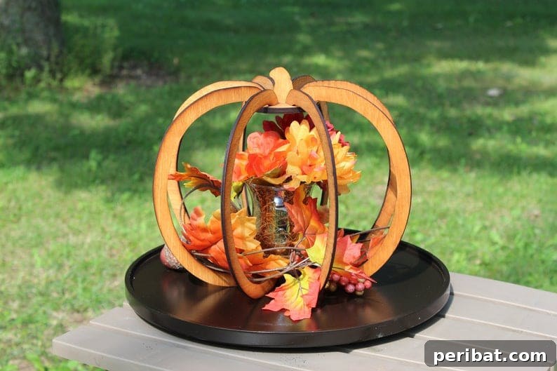 55+ Creative DIY Pumpkin Decorating Ideas for Fall 40 An elegantly designed Glowforge pumpkin made of laser-cut wood pieces