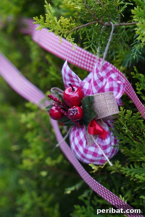 Sixty Sparkling DIY Ornaments for Your Christmas Tree 31 Red checkere ornament in tree