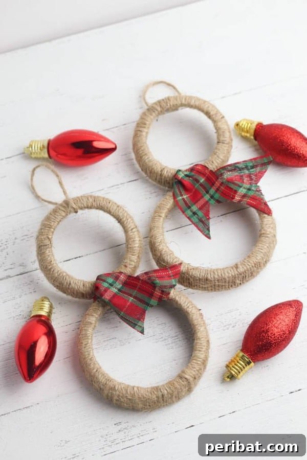 Sixty Sparkling DIY Ornaments for Your Christmas Tree 44 Twine snowman on table