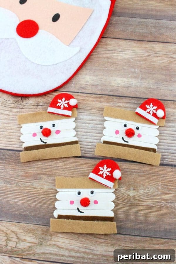 Sixty Sparkling DIY Ornaments for Your Christmas Tree 46 Smores santa on table