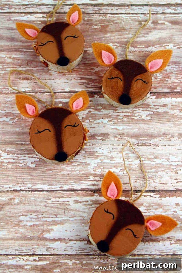 Sixty Sparkling DIY Ornaments for Your Christmas Tree 49 Painted deer ornament on table
