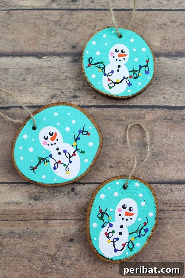 Sixty Sparkling DIY Ornaments for Your Christmas Tree 50 Painted snowman theme on table