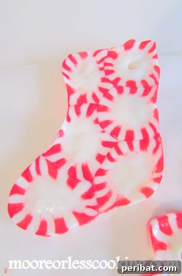 Sixty Sparkling DIY Ornaments for Your Christmas Tree 56 Peppermint candy stocking on table