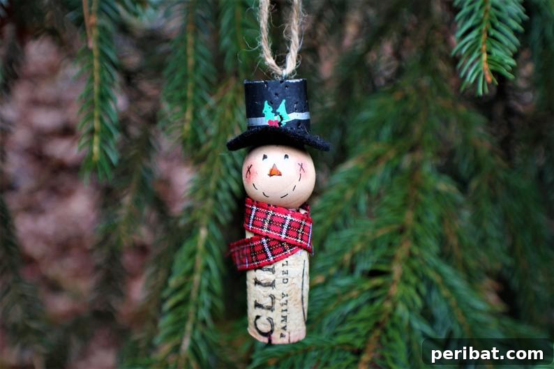 Sixty Sparkling DIY Ornaments for Your Christmas Tree 59 Snowman cork ornament on tree