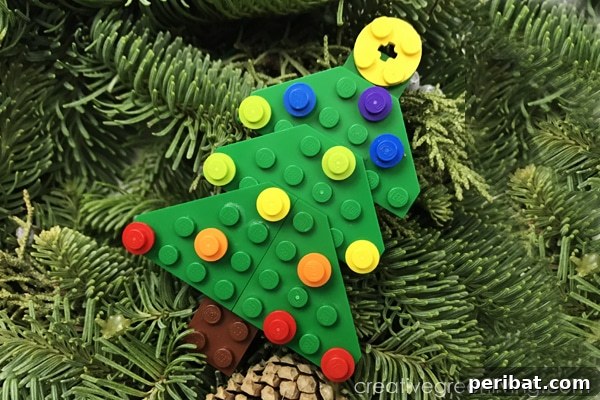 Sixty Sparkling DIY Ornaments for Your Christmas Tree 66 Lego tree laying on tree branch