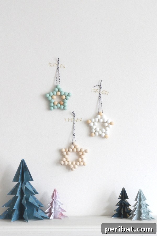 Sixty Sparkling DIY Ornaments for Your Christmas Tree 68 Bead stars on white wall