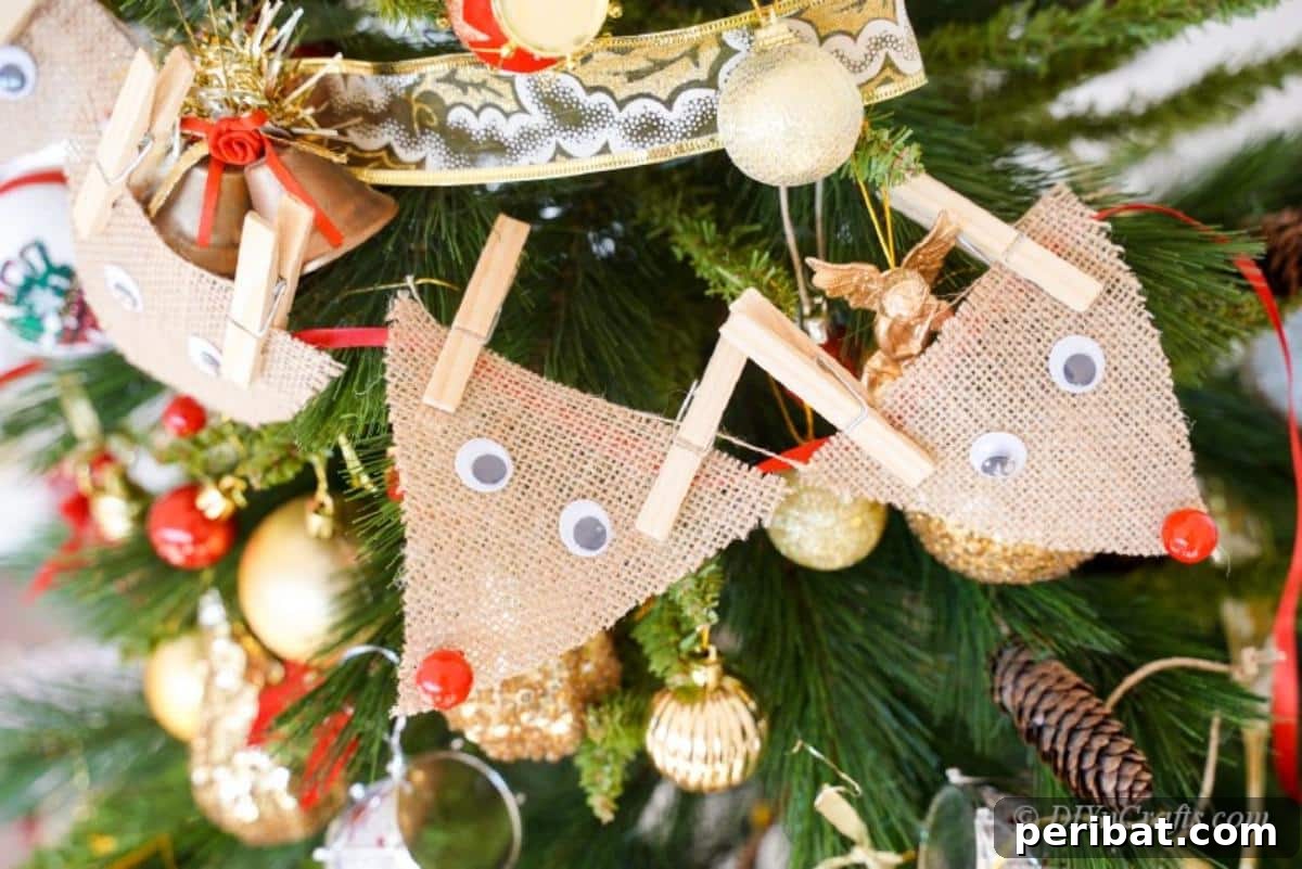 Rustic Reindeer Burlap Garland 3 Rustic burlap reindeer figures arranged on a Christmas tree branch