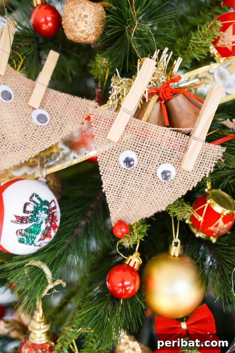 Rustic Reindeer Burlap Garland 19 Burlap reindeer garland gracefully draped on a Christmas tree