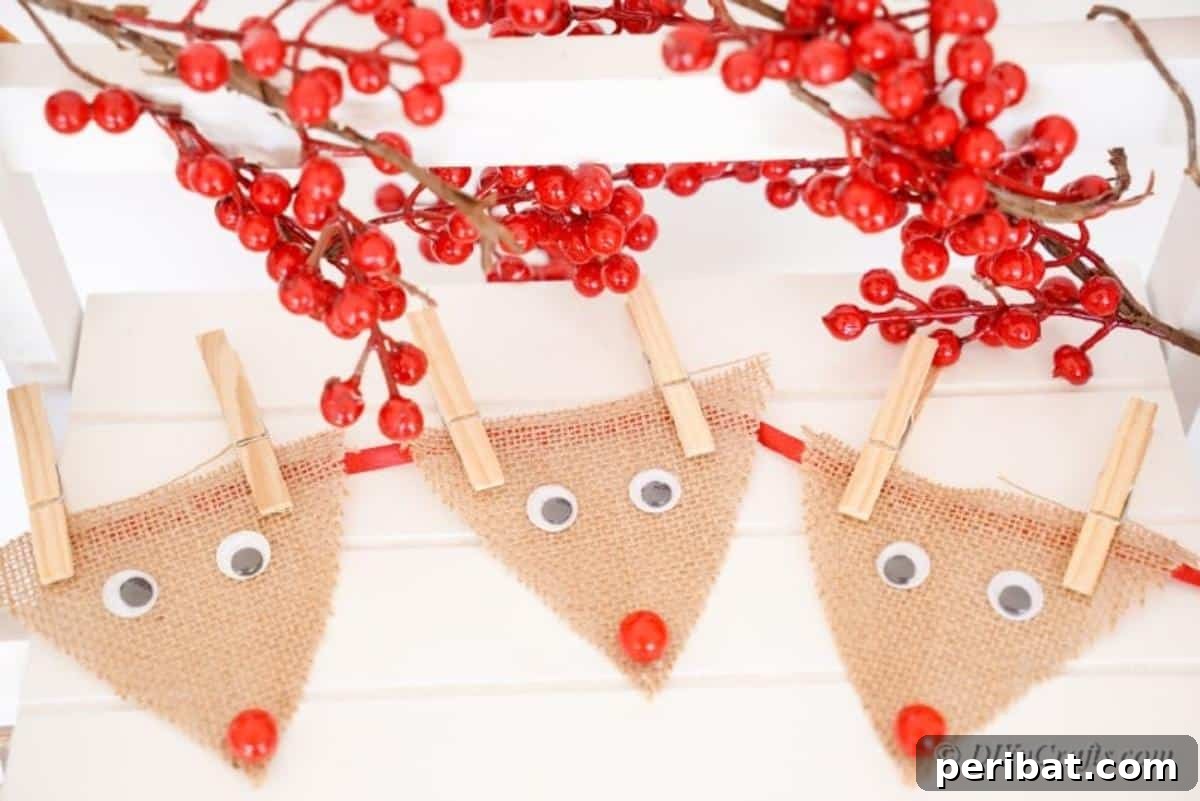 Rustic Reindeer Burlap Garland 4 Burlap reindeer craft pieces with holiday cherries on a table