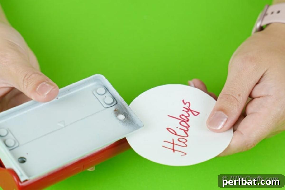 Hole punching a paper craft ornament
