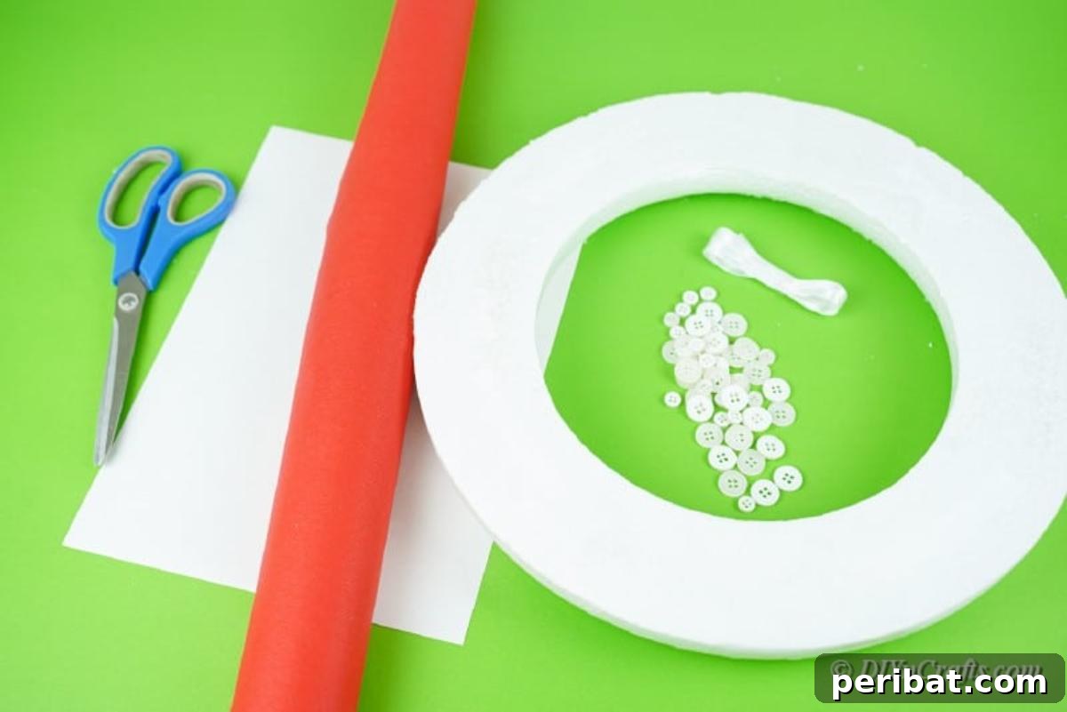 Collection of craft supplies including buttons, paper, and scissors