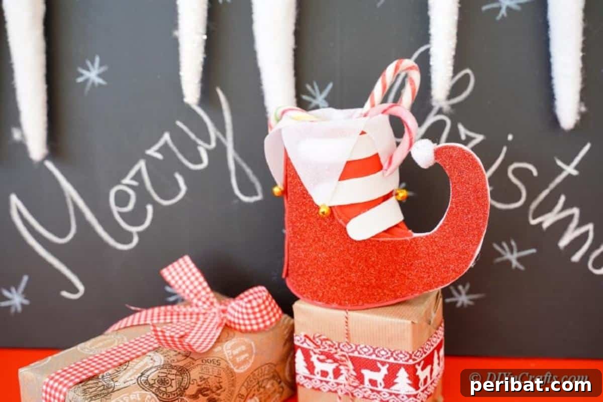 Upcycled Plastic Bottle Santa Boot Decor 18 Craft foam boot sitting gracefully in front of a rustic chalkboard display, ideal for farmhouse Christmas decor