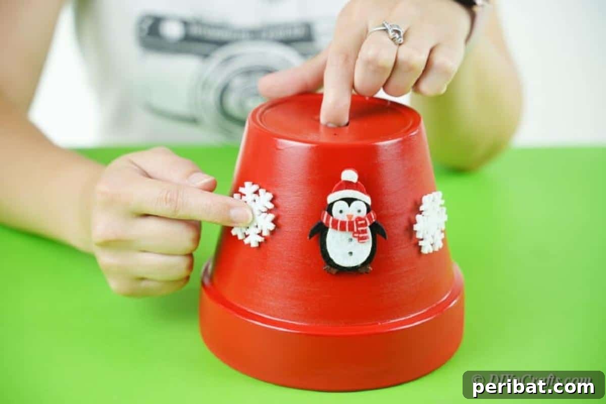 Festive Candy Dispenser on a Budget 12 decorating painted clay pot