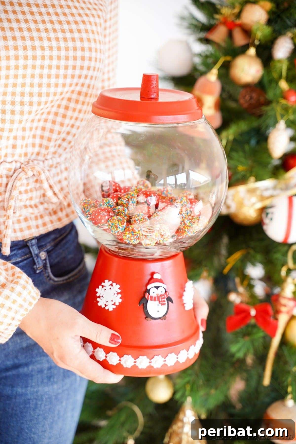 Festive Candy Dispenser on a Budget 6 woman holding flower pot candy jar