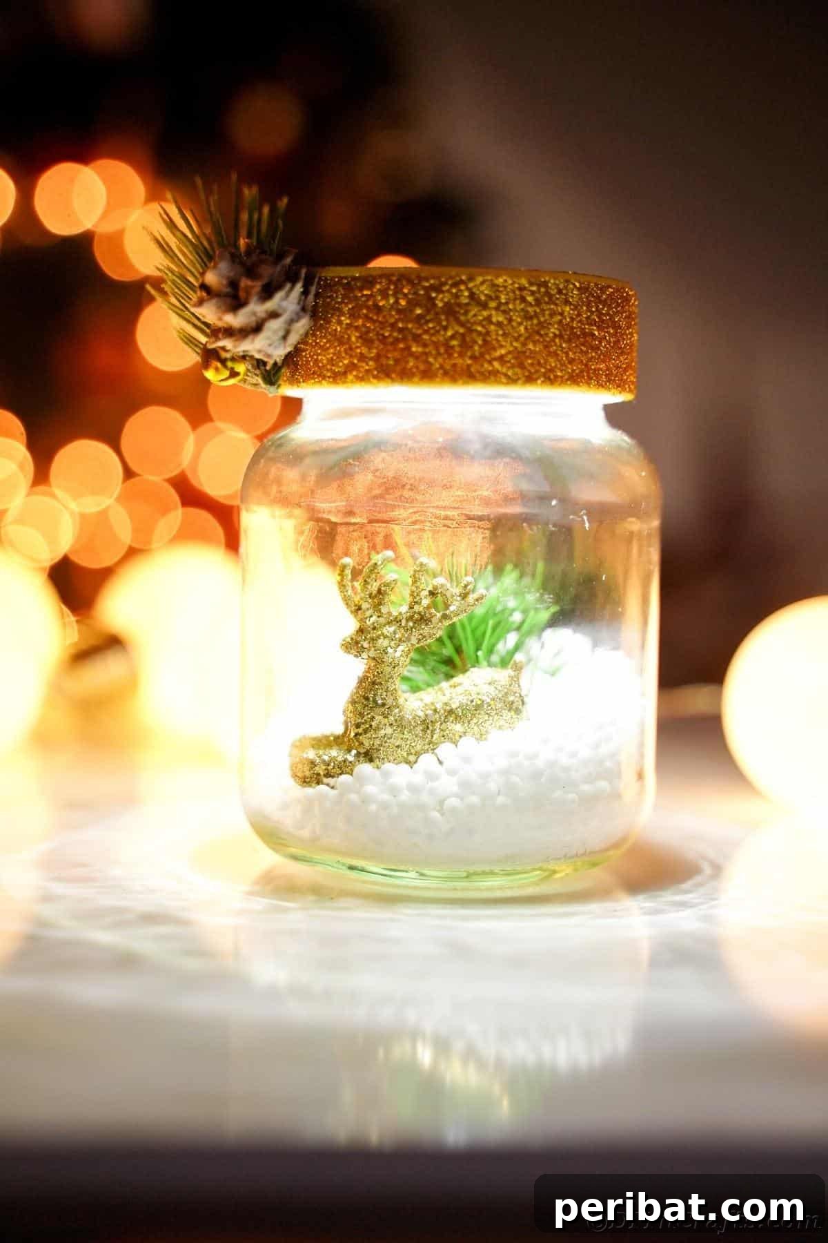 DIY Upcycled Christmas Snow Globe 7 twinkle lights on table behind snow globe
