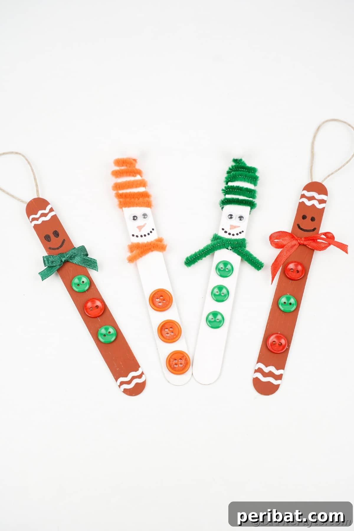 Sweet and Snowy Craft Stick Holiday Decor 27 Assortment of decorated craft stick ornaments displayed on a white table