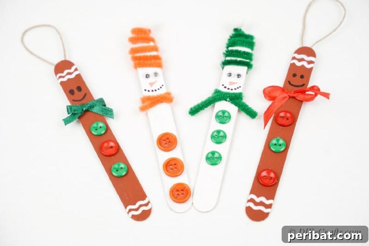 Sweet and Snowy Craft Stick Holiday Decor 5 Close-up of craft stick ornament characters on a table, showcasing different designs