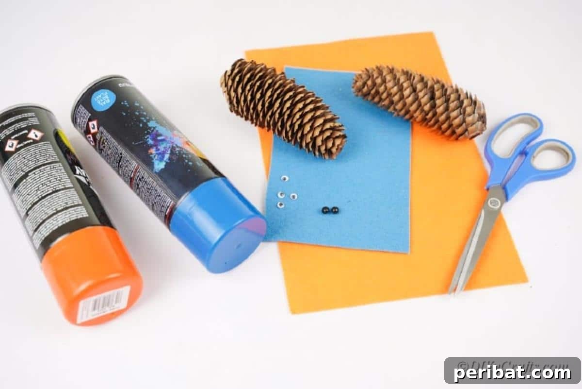 Whimsical Pinecone Hedgehogs 8 Various craft supplies laid out on a table, including pinecones, colorful felt sheets, googly eyes, scissors, and beads, ready for a DIY project.