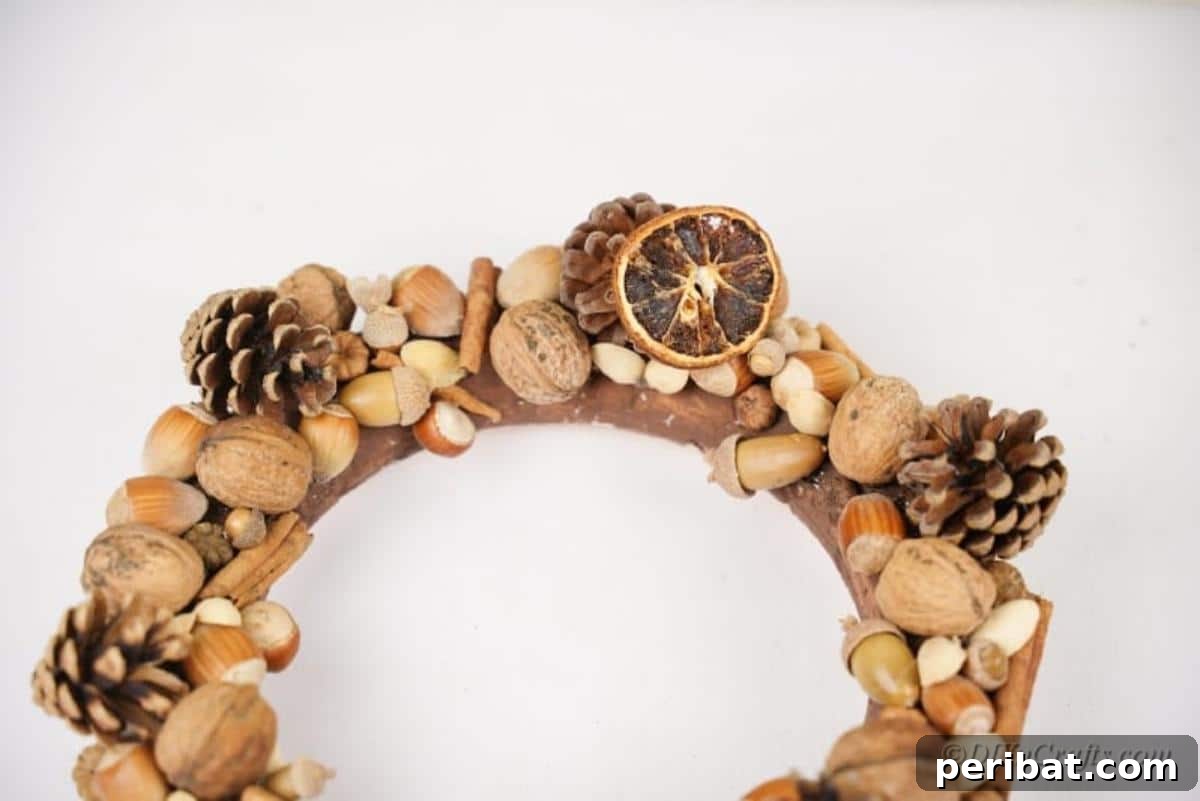 Foraged Fall Wreath 10 rustic wreath being decorated with small pieces
