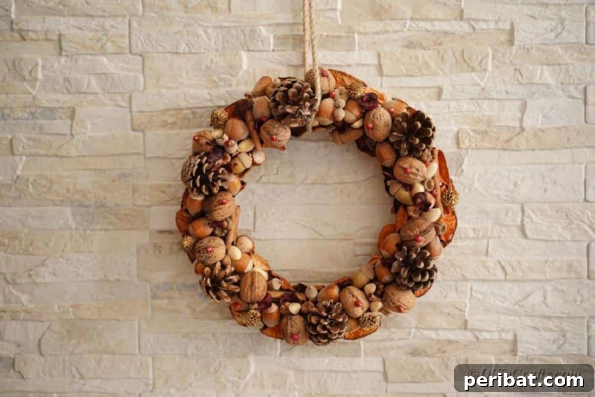 Foraged Fall Wreath 3 wreatth hanging against stone wall