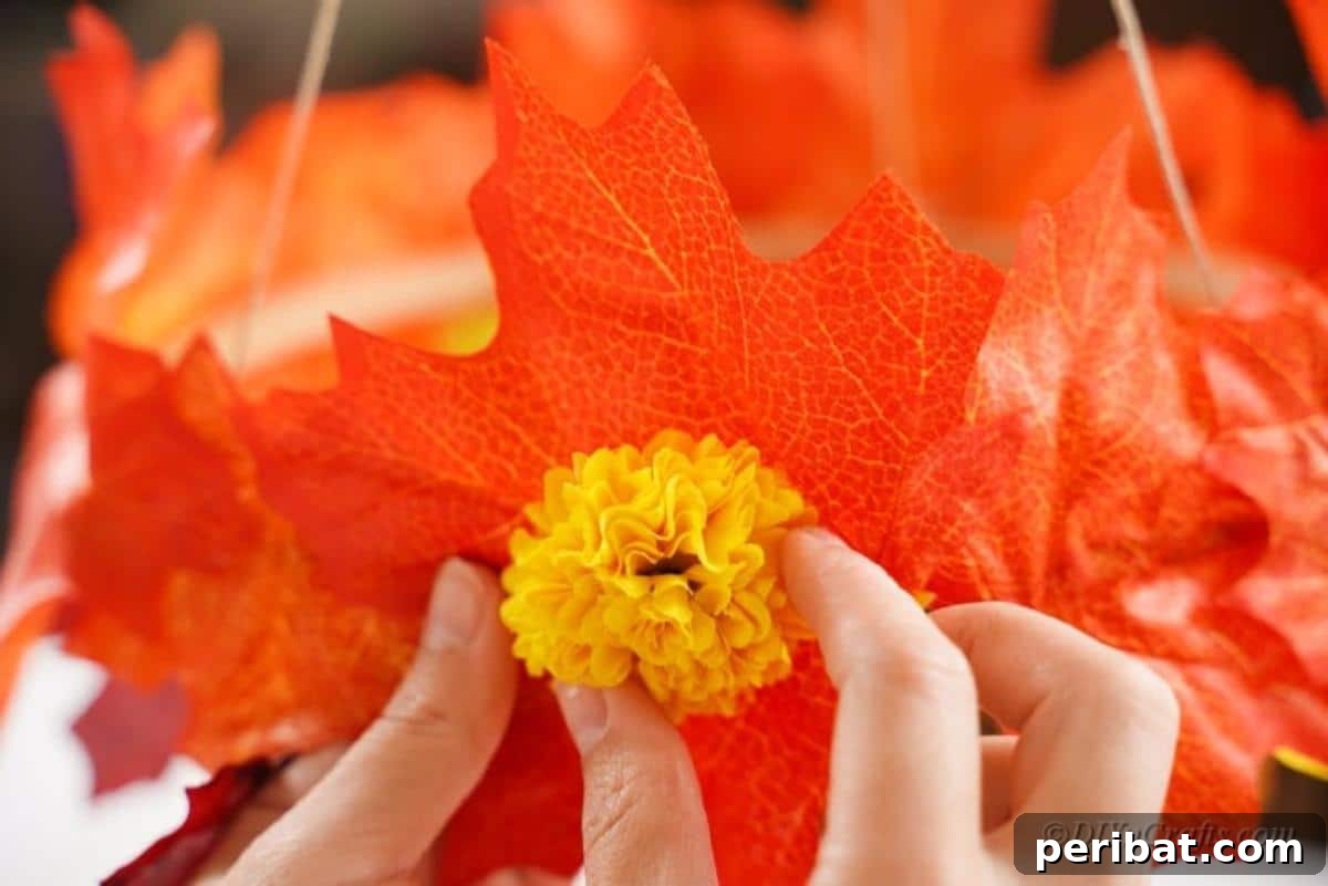 Vibrant Autumn Leaves Mobile 11 hand adding flowers to fake leaves craft