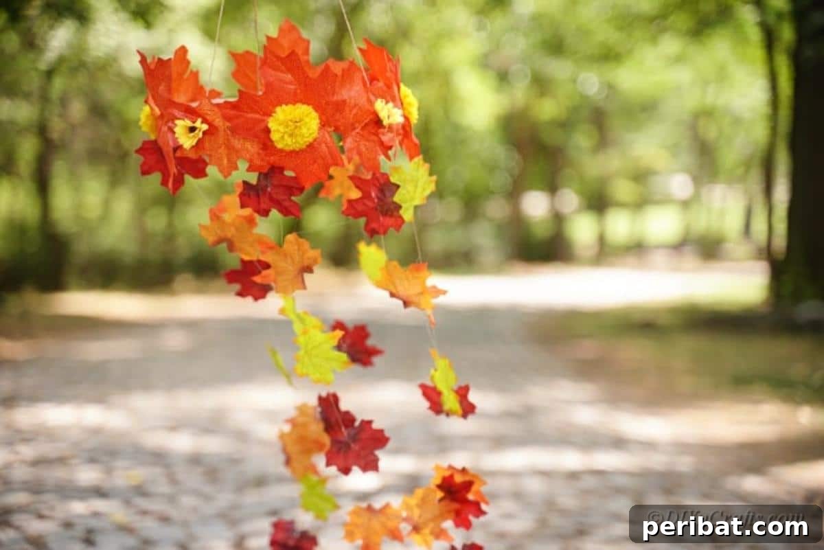 Vibrant Autumn Leaves Mobile 16 Artificial leaf mobile hanging in park