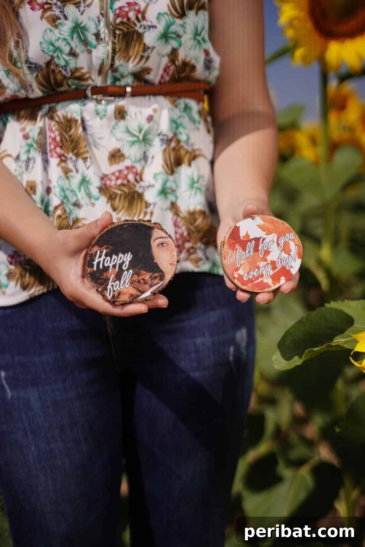Autumnal Wood Slice Photo Keepsakes 14 Woman in floral shirt holding wood slice photos in hands next to sunflowers